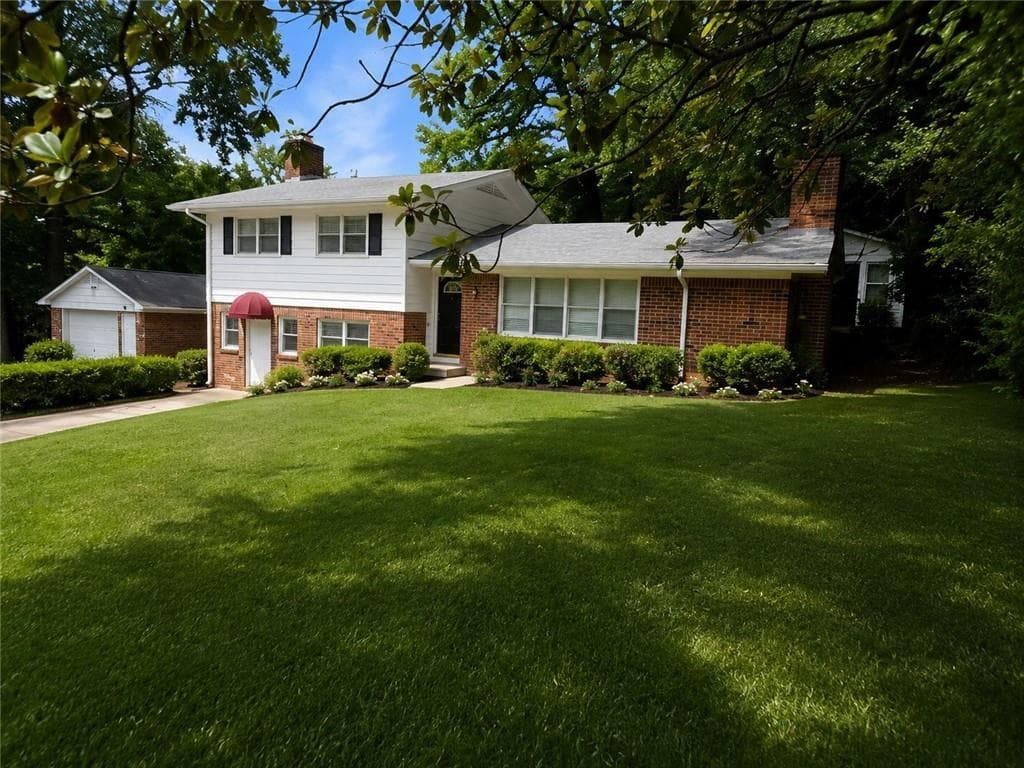 4 bedroom, 2 bathroom, 1,621 sq ft single family residence for sale at 1037 Mell Avenue, Clarkston, GA 30021 — photo 3