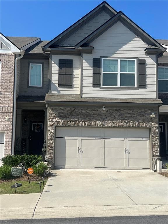 3 bedroom, 3 bathroom, 1,957 sq ft townhouse for sale at 7705 Baron Road, South Fulton, GA 30213 — photo 1 of 24