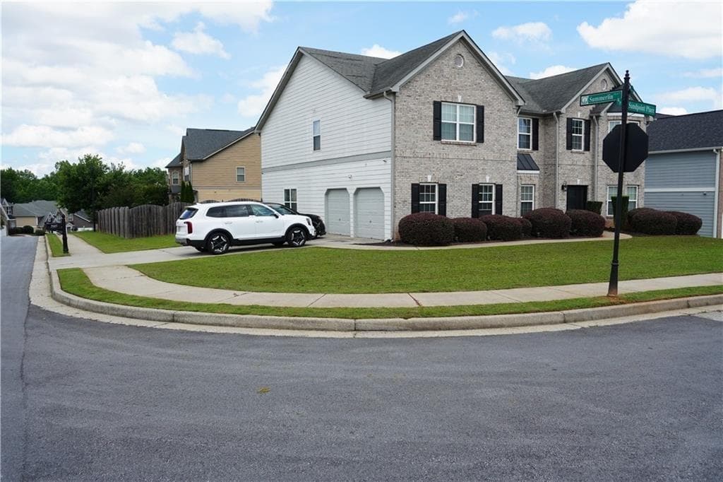 5 bedroom, 4 bathroom, 4,316 sq ft single family residence for sale at 7985 Sandpoint Place, Lithia Springs, GA 30122 — photo 2