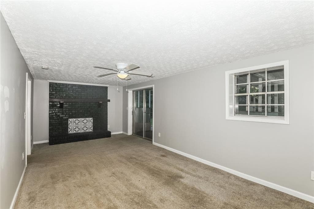 4 bedroom, 3 bathroom, 2,064 sq ft single family residence for sale at 2734 Noahs Ark Road, Jonesboro, GA 30236 — photo 2