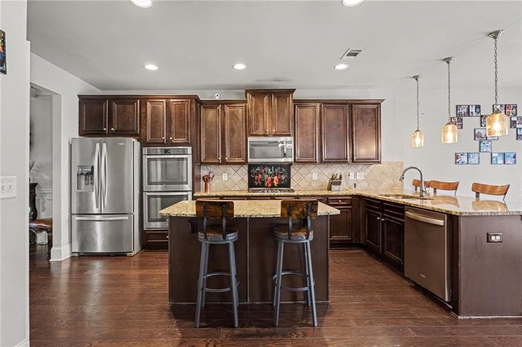 7 bedroom, 5 bathroom, 5,141 sq ft single family residence for sale at 104 Gambier Cove, Mcdonough, GA 30252 — photo 4