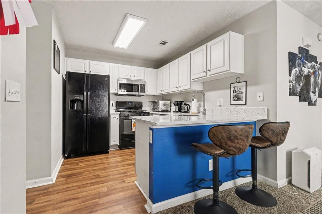 2 bedroom, 2 bathroom, 1,272 sq ft single family residence for sale at 1073 Daventry Crossing, Woodstock, GA 30188 — photo 3
