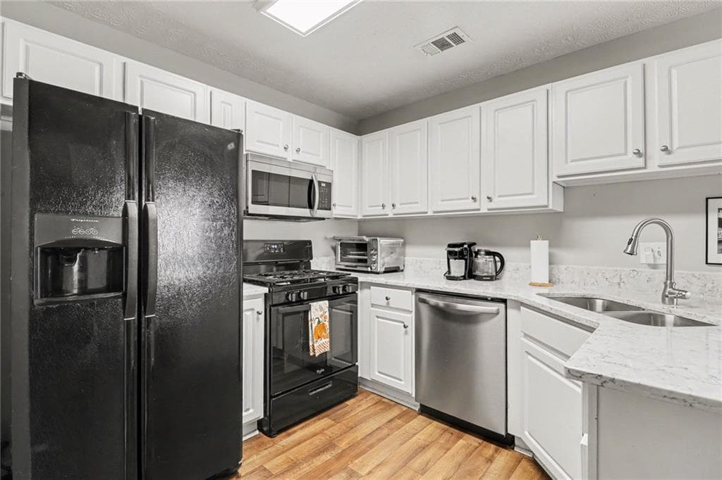 2 bedroom, 2 bathroom, 1,272 sq ft single family residence for sale at 1073 Daventry Crossing, Woodstock, GA 30188 — photo 9