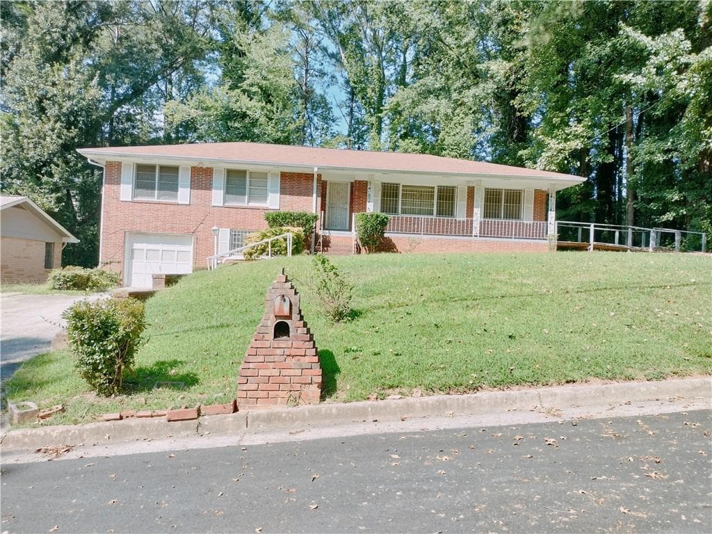 4 bedroom, 3 bathroom, 1,610 sq ft single family residence for sale at 2641 Hedgewood Lane, Atlanta, GA 30311