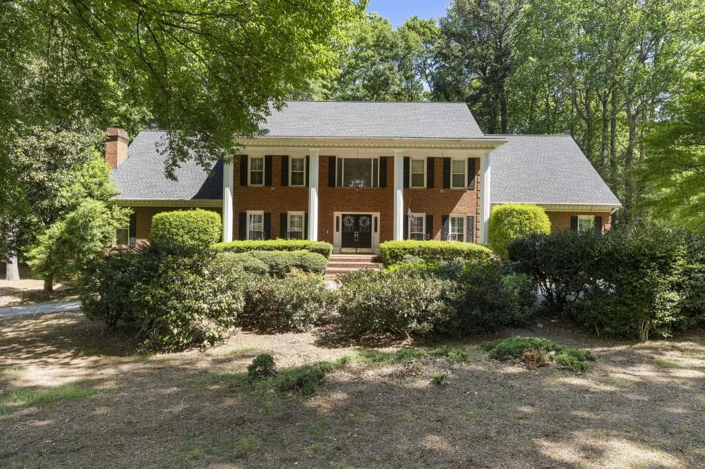 6 bedroom, 7 bathroom, 5,176 sq ft single family residence for sale at 1780 Brandon Hall Drive, Atlanta, GA 30350 — photo 2