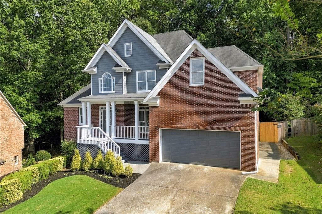 6 bedroom, 5 bathroom, 4,990 sq ft single family residence for sale at 5375 Lexington View Place, Sugar Hill, GA 30518 — photo 2