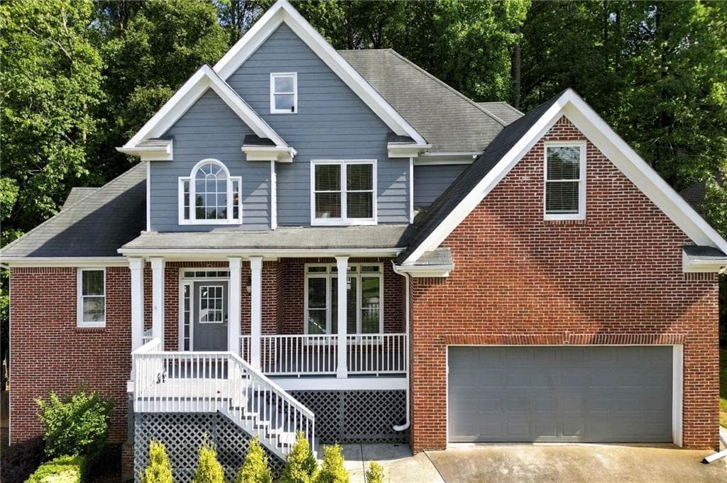 6 bedroom, 5 bathroom, 4,990 sq ft single family residence for sale at 5375 Lexington View Place, Sugar Hill, GA 30518 — photo 3