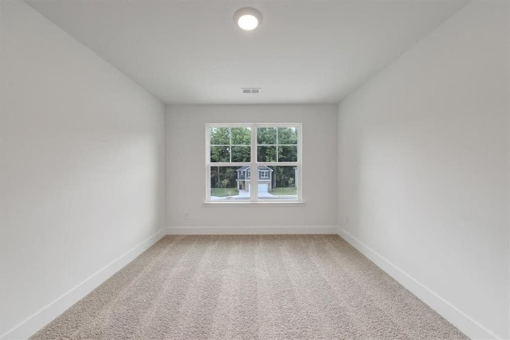 3 bedroom, 3 bathroom, 1,643 sq ft single family residence for sale at 215 Laney Drive, Carrollton, GA 30117 — photo 4