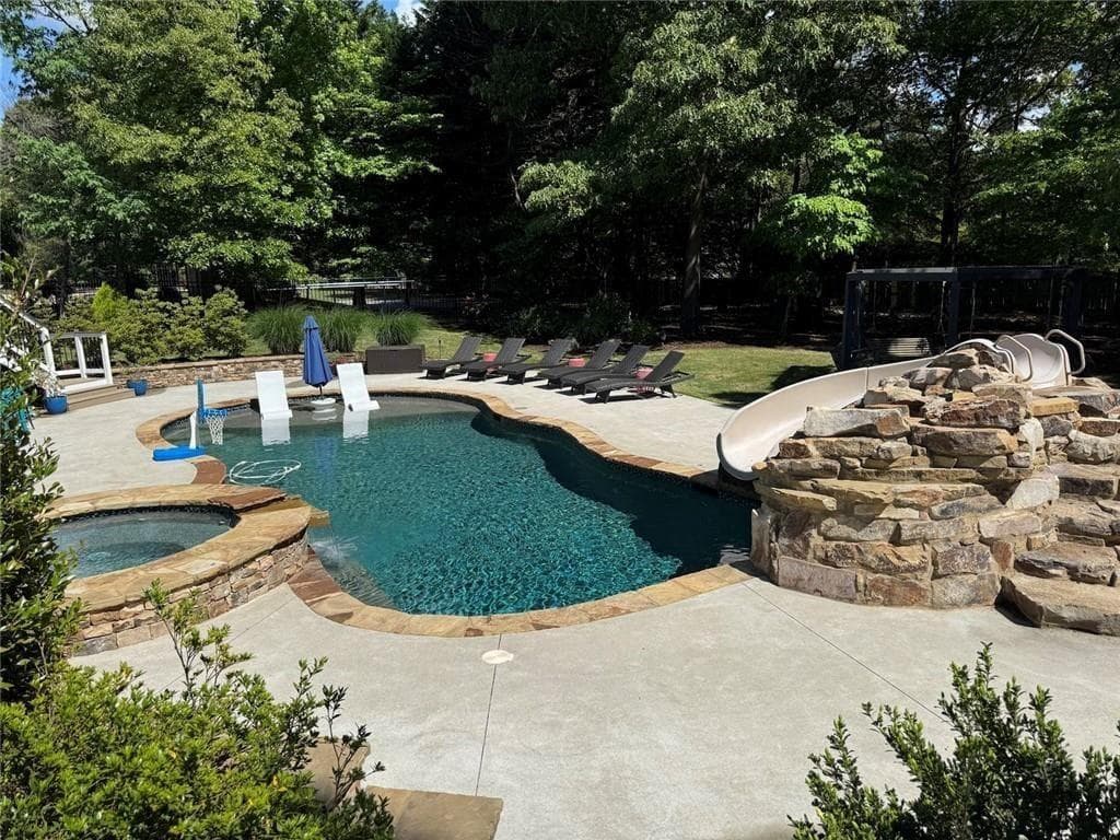 6 bedroom, 6 bathroom, 7,699 sq ft single family residence for sale at 6741 Great Water Drive, Flowery Branch, GA 30542 — photo 2