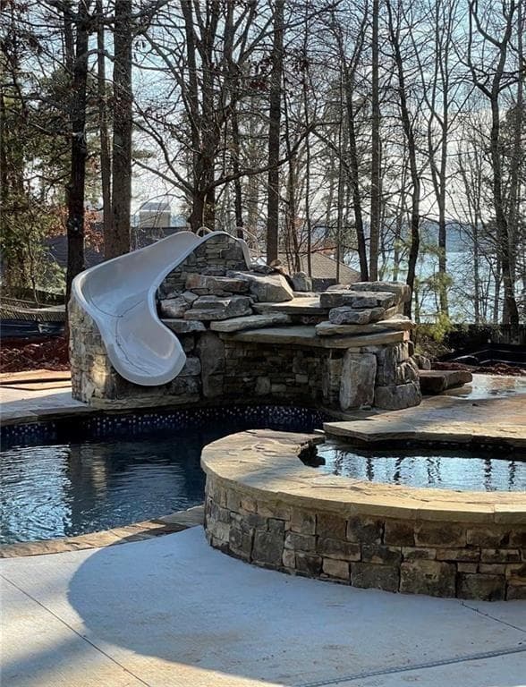 6 bedroom, 6 bathroom, 7,699 sq ft single family residence for sale at 6741 Great Water Drive, Flowery Branch, GA 30542 — photo 3