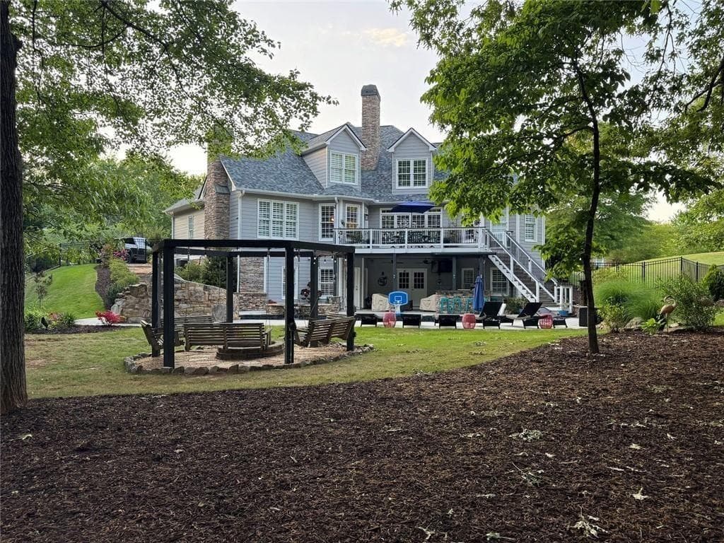 6 bedroom, 6 bathroom, 7,699 sq ft single family residence for sale at 6741 Great Water Drive, Flowery Branch, GA 30542 — photo 4