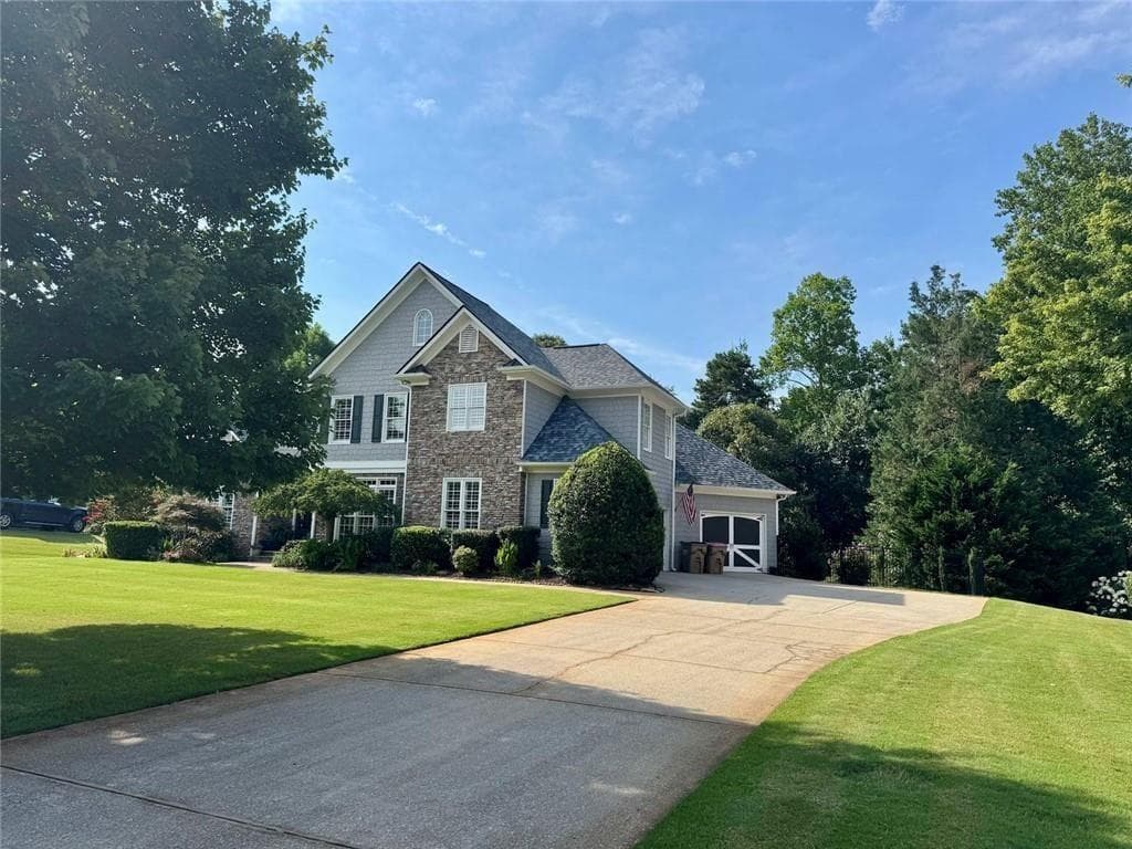 6 bedroom, 6 bathroom, 7,699 sq ft single family residence for sale at 6741 Great Water Drive, Flowery Branch, GA 30542 — photo 8