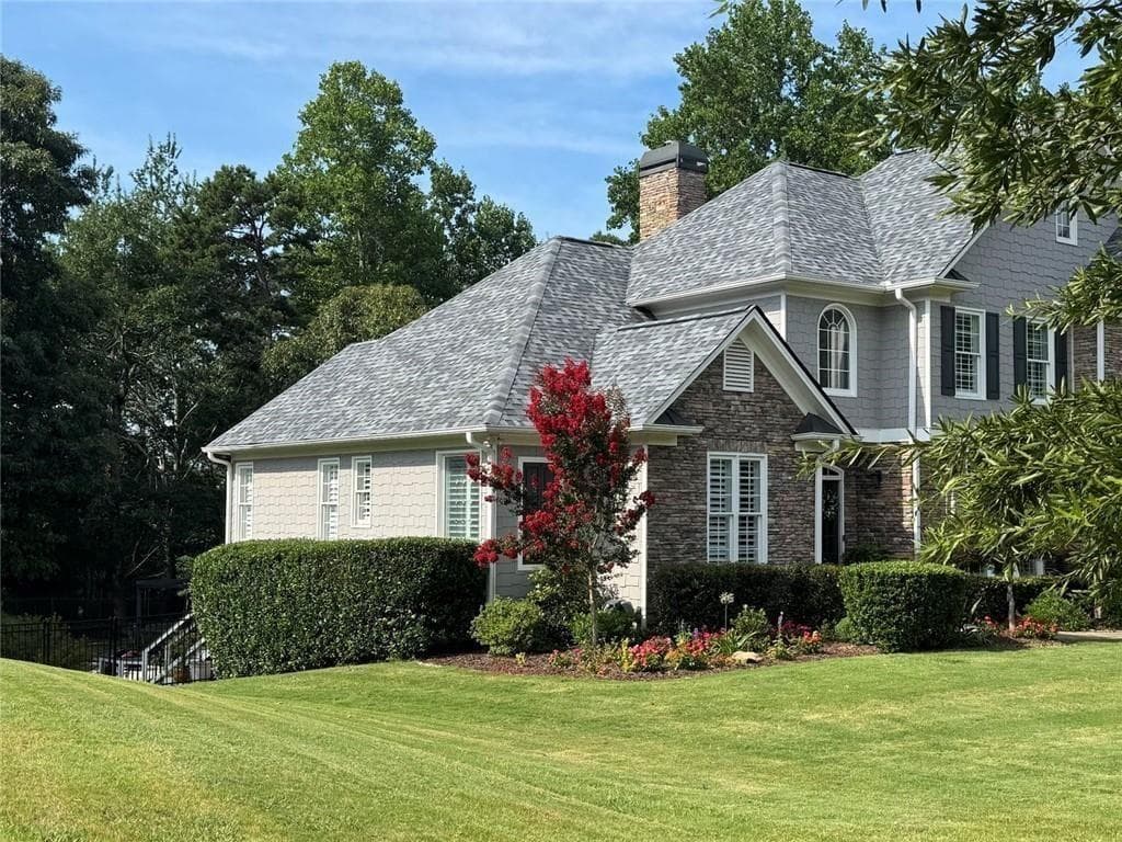 6 bedroom, 6 bathroom, 7,699 sq ft single family residence for sale at 6741 Great Water Drive, Flowery Branch, GA 30542 — photo 9