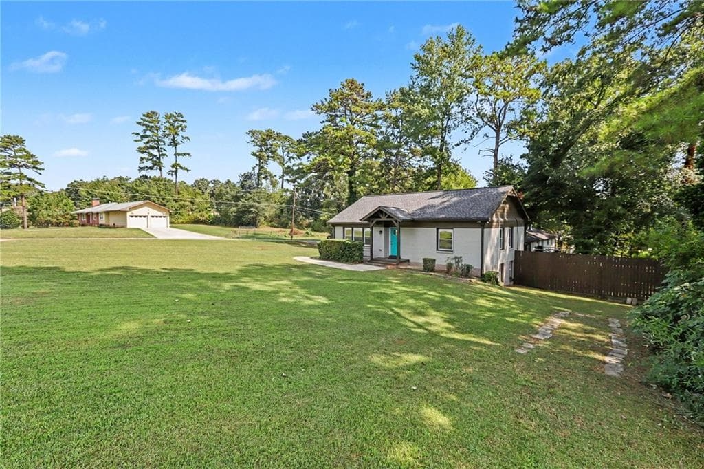 5 bedroom, 2 bathroom, 1,578 sq ft single family residence for sale at 4722 Covington Highway, Decatur, GA 30035 — photo 3