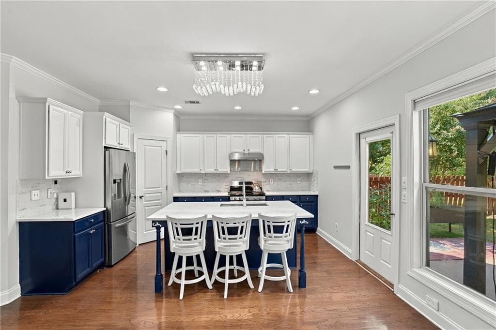 6 bedroom, 4 bathroom, 3,569 sq ft single family residence for sale at 5765 White Creek Run, Cumming, GA 30040 — photo 2