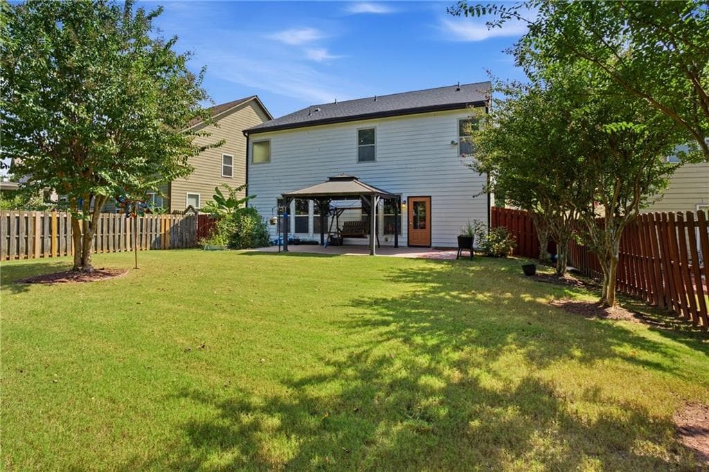 6 bedroom, 4 bathroom, 3,569 sq ft single family residence for sale at 5765 White Creek Run, Cumming, GA 30040 — photo 5