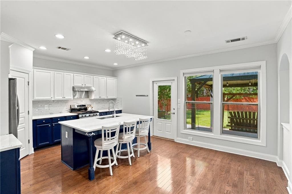 6 bedroom, 4 bathroom, 3,569 sq ft single family residence for sale at 5765 White Creek Run, Cumming, GA 30040 — photo 10