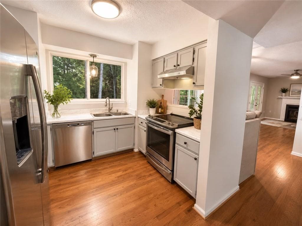 5 bedroom, 4 bathroom, 1,673 sq ft single family residence for sale at 10535 Virginia Pine Lane, Johns Creek, GA 30022 — photo 4