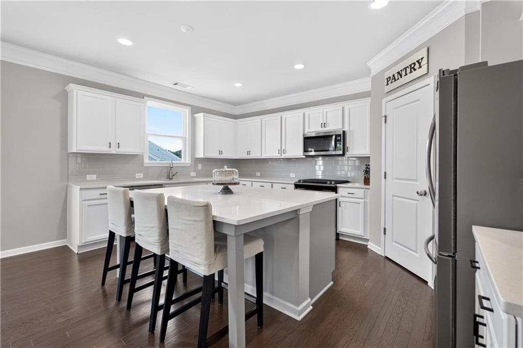 5 bedroom, 4 bathroom, 3,218 sq ft single family residence for sale at 505 Anfield Drive, Woodstock, GA 30188 — photo 10