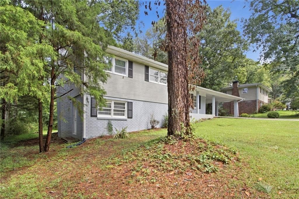 3 bedroom, 2 bathroom, 2,084 sq ft single family residence for sale at 7280 Hollyhock Drive, Douglasville, GA 30135 — photo 2