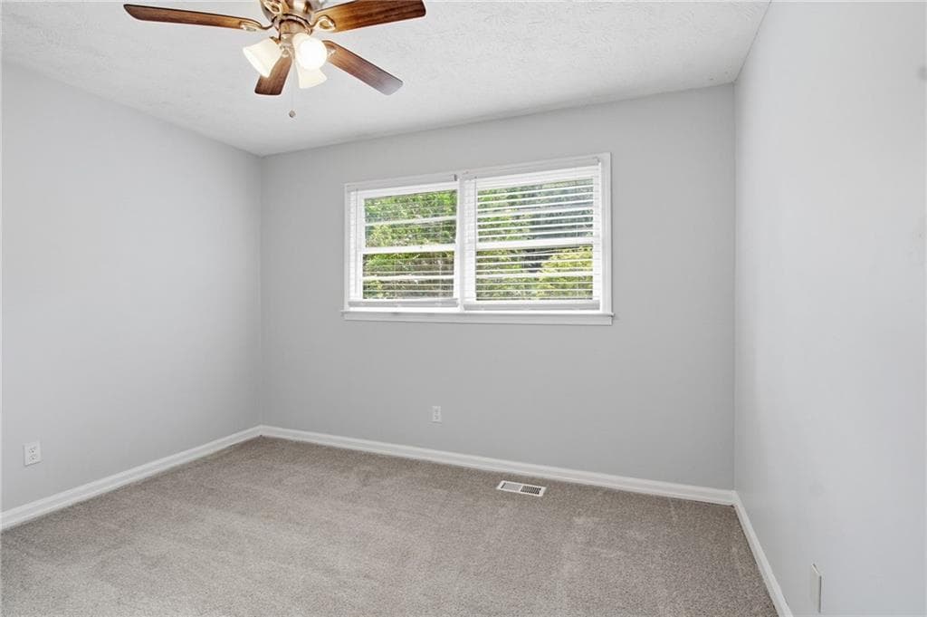 3 bedroom, 2 bathroom, 2,084 sq ft single family residence for sale at 7280 Hollyhock Drive, Douglasville, GA 30135 — photo 10