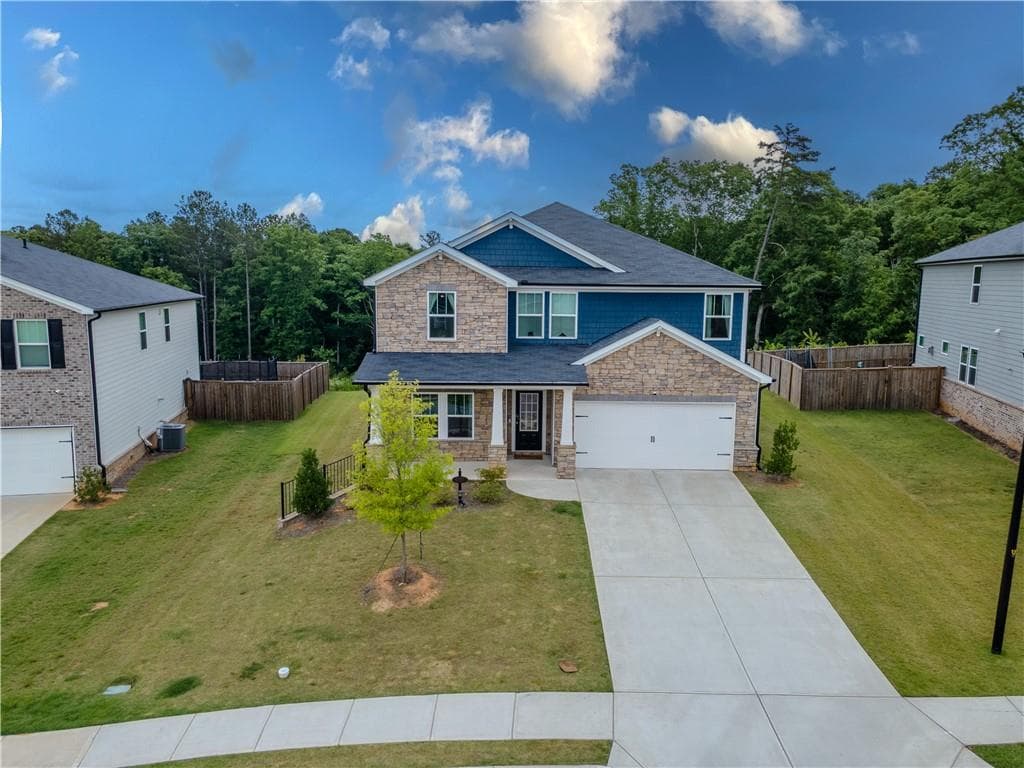 5 bedroom, 3 bathroom, 3,321 sq ft single family residence for sale at 4311 Dean Grove Way, Loganville, GA 30052 — photo 3
