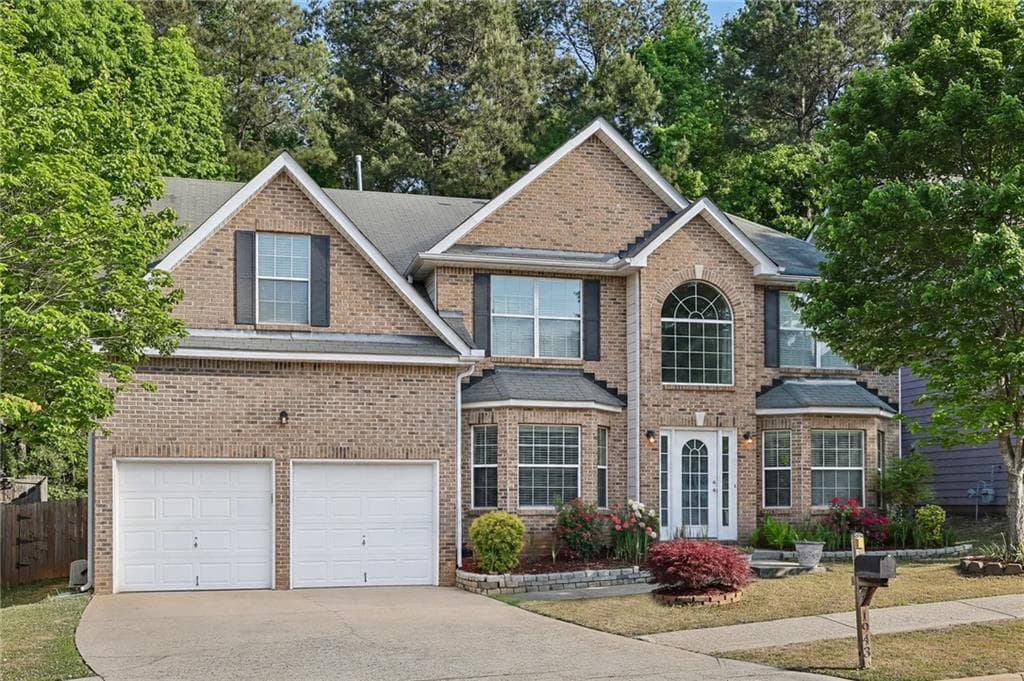 5 bedroom, 3 bathroom, 3,377 sq ft single family residence for sale at 1943 Tulip Petal Road, Auburn, GA 30011 — photo 1 of 35