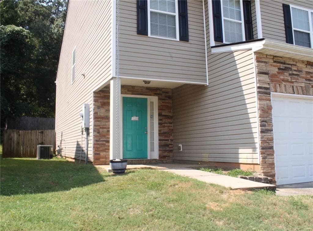 4 bedroom, 3 bathroom, 2,244 sq ft single family residence for sale at 7809 Newbury Drive, Jonesboro, GA 30236 — photo 3