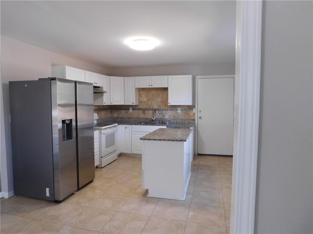2 bedroom, 2 bathroom, 936 sq ft single family residence for sale at 2625 Rock Chapel Road, Lithonia, GA 30058 — photo 4