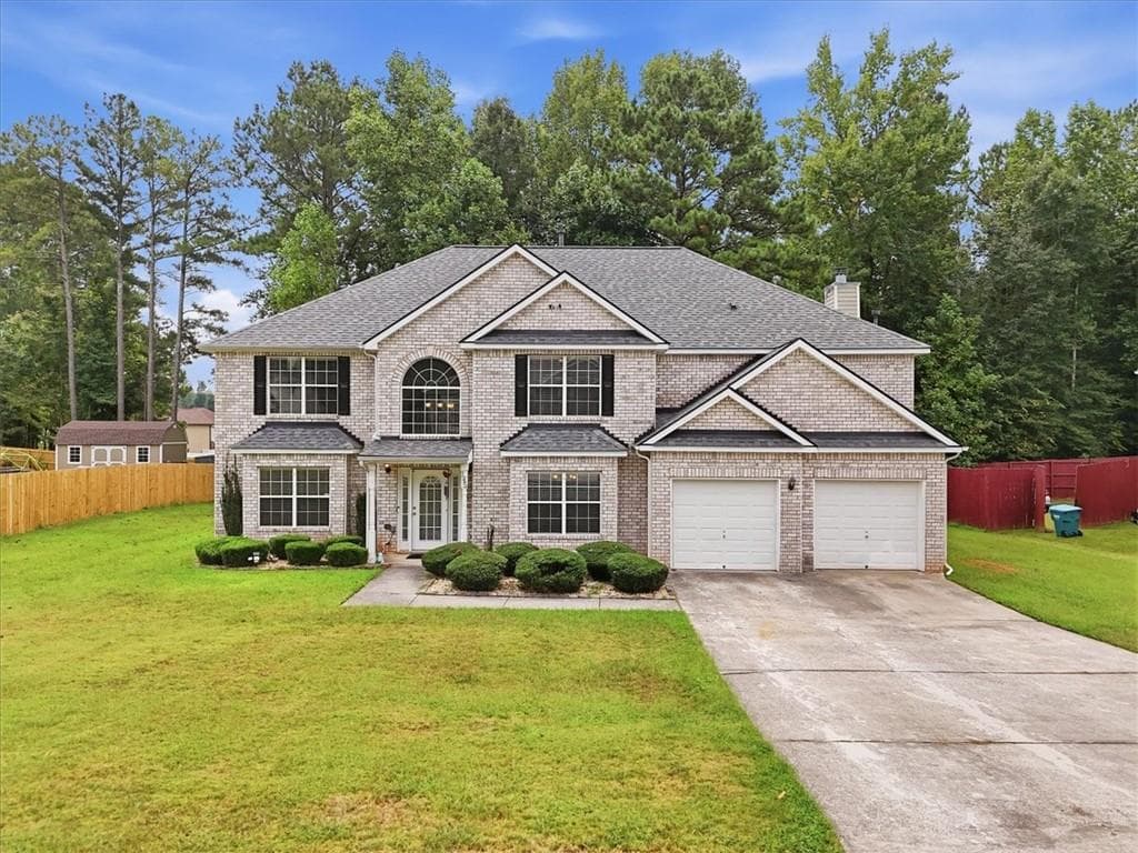5 bedroom, 3 bathroom, 4,733 sq ft single family residence for sale at 145 Madisyn Drive, Hampton, GA 30228 — photo 1 of 69
