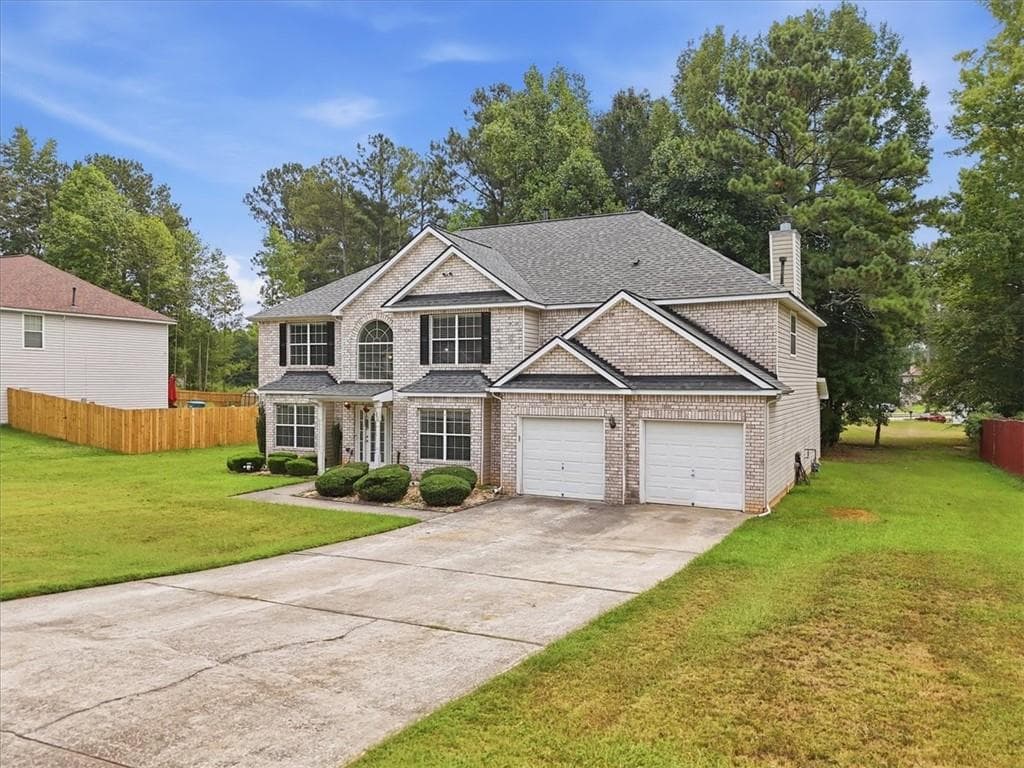 5 bedroom, 3 bathroom, 4,733 sq ft single family residence for sale at 145 Madisyn Drive, Hampton, GA 30228 — photo 3