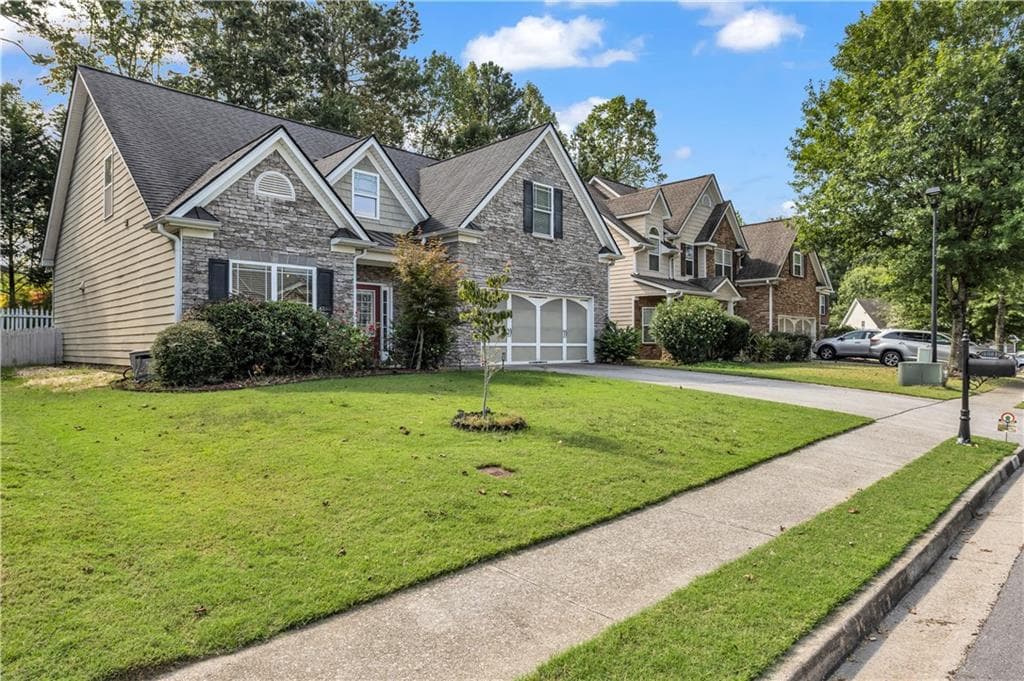 4 bedroom, 3 bathroom, 2,101 sq ft single family residence for sale at 1081 Arbor Grove Road, Sugar Hill, GA 30518 — photo 2