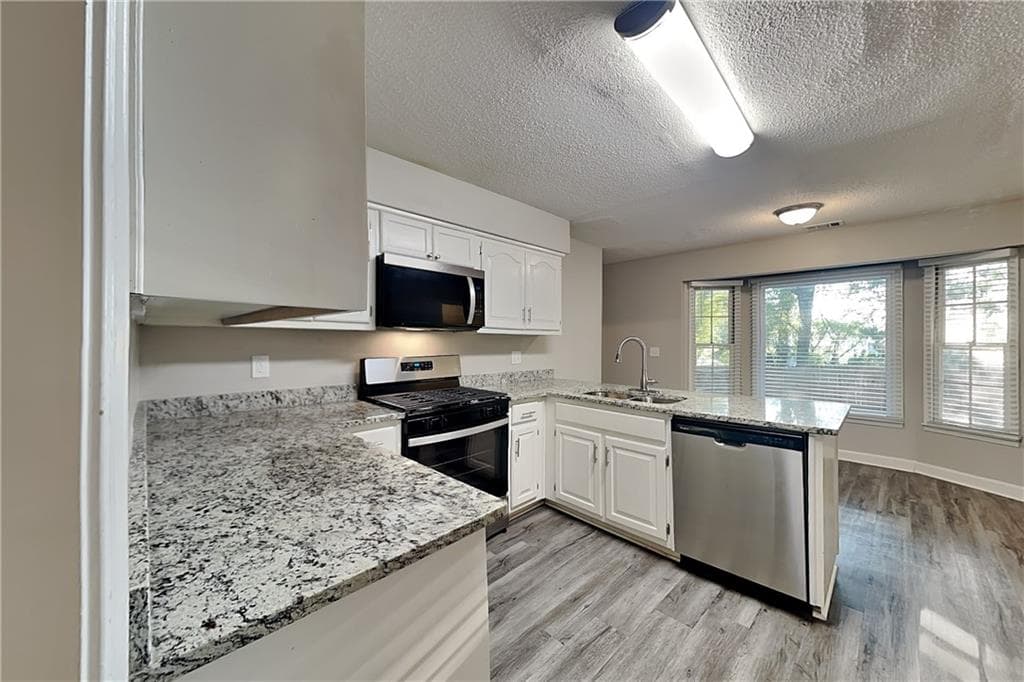 3 bedroom, 3 bathroom, 1,936 sq ft single family residence for rent at 707 Ketch Cove, Woodstock, GA 30189 for $2,295 a month — photo 4