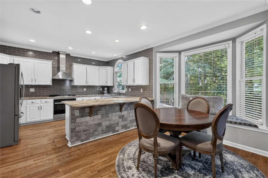 5 bedroom, 4 bathroom, 4,418 sq ft single family residence for sale at 2540 Woodbrook Court, Lawrenceville, GA 30043 — photo 5