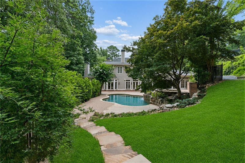 5 bedroom, 7 bathroom, 6,124 sq ft single family residence for sale at 4992 Rebel Trail, Atlanta, GA 30327 — photo 2
