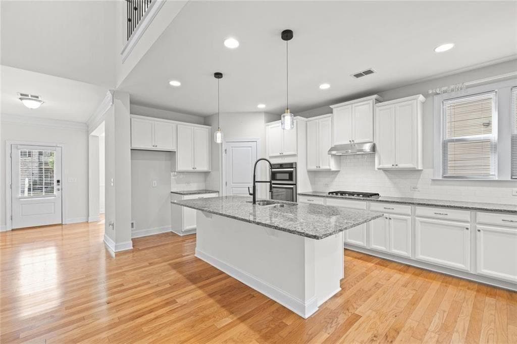 4 bedroom, 4 bathroom, 3,347 sq ft single family residence for sale at 4493 Thach Avenue, Sugar Hill, GA 30518 — photo 7