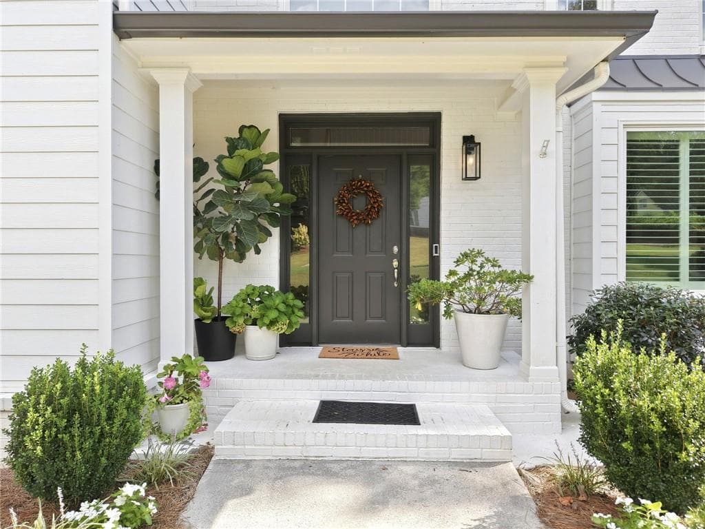 4 bedroom, 3 bathroom, 2,850 sq ft single family residence for sale at 4790 Hamptons Club Drive, Alpharetta, GA 30004 — photo 2