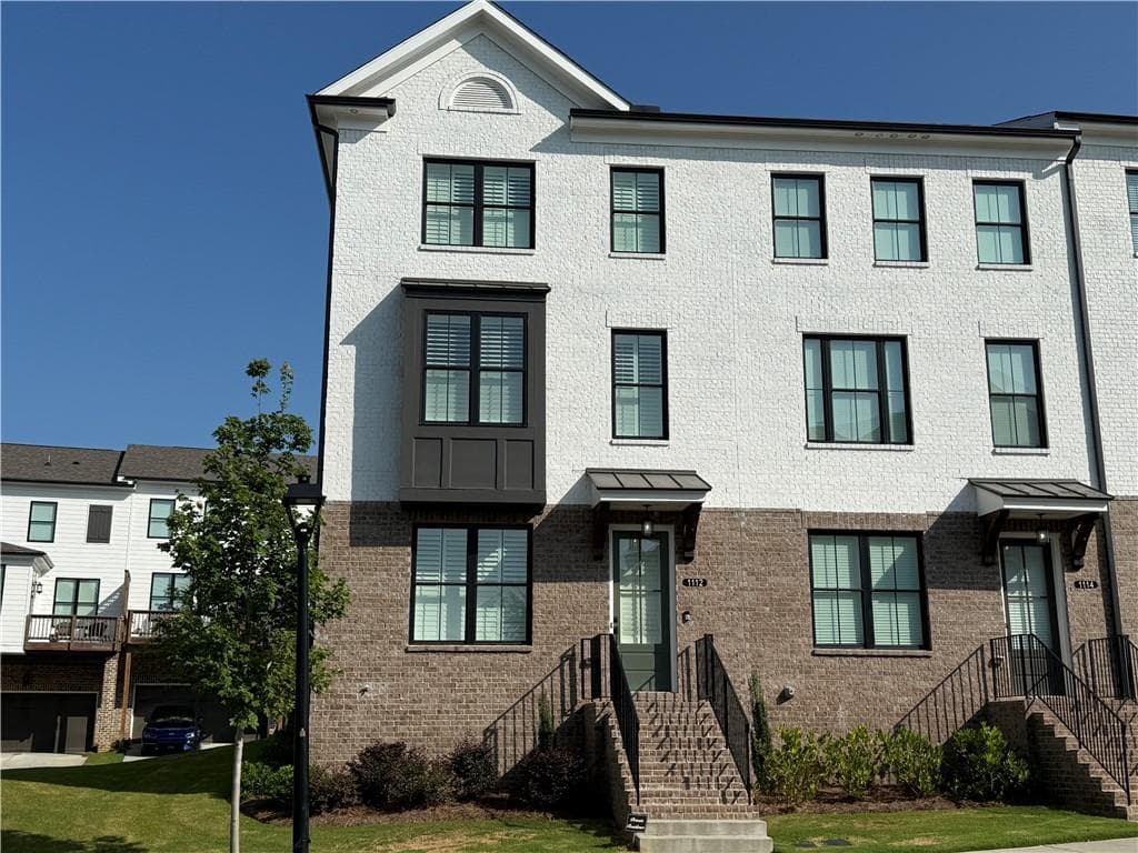 3 bedroom, 4 bathroom, 2,016 sq ft townhouse for rent at 1112 Larkin Drive, Buford, GA 30518 for $2,595 a month — photo 1 of 15