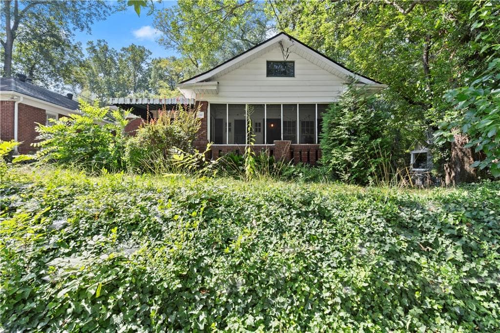 4 bedroom, 4 bathroom, 3,850 sq ft single family residence for sale at 1141 Rosedale Drive, Atlanta, GA 30306 — photo 2