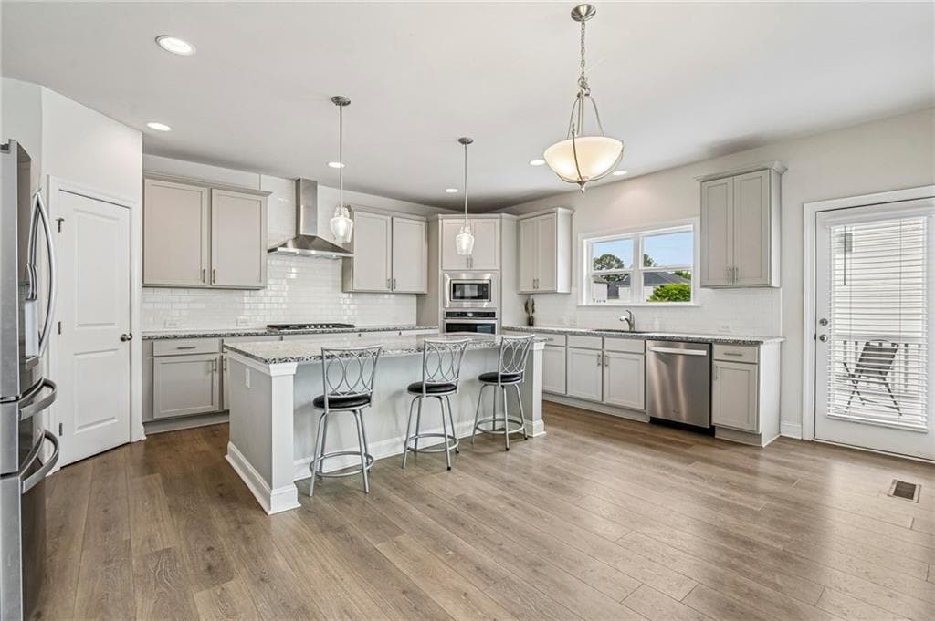5 bedroom, 4 bathroom, 3,279 sq ft single family residence for sale at 129 Edinburgh Drive, Canton, GA 30115 — photo 4