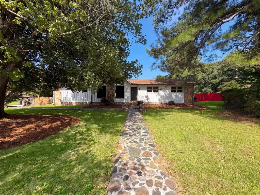 3 bedroom, 2 bathroom, 1,971 sq ft single family residence for sale at 5810 Orly Terrace, Atlanta, GA 30349 — photo 1 of 28