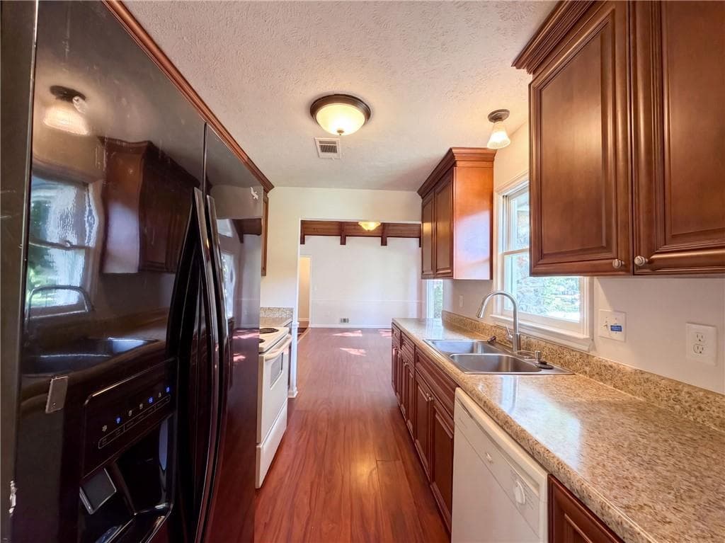 3 bedroom, 2 bathroom, 1,971 sq ft single family residence for sale at 5810 Orly Terrace, Atlanta, GA 30349 — photo 2