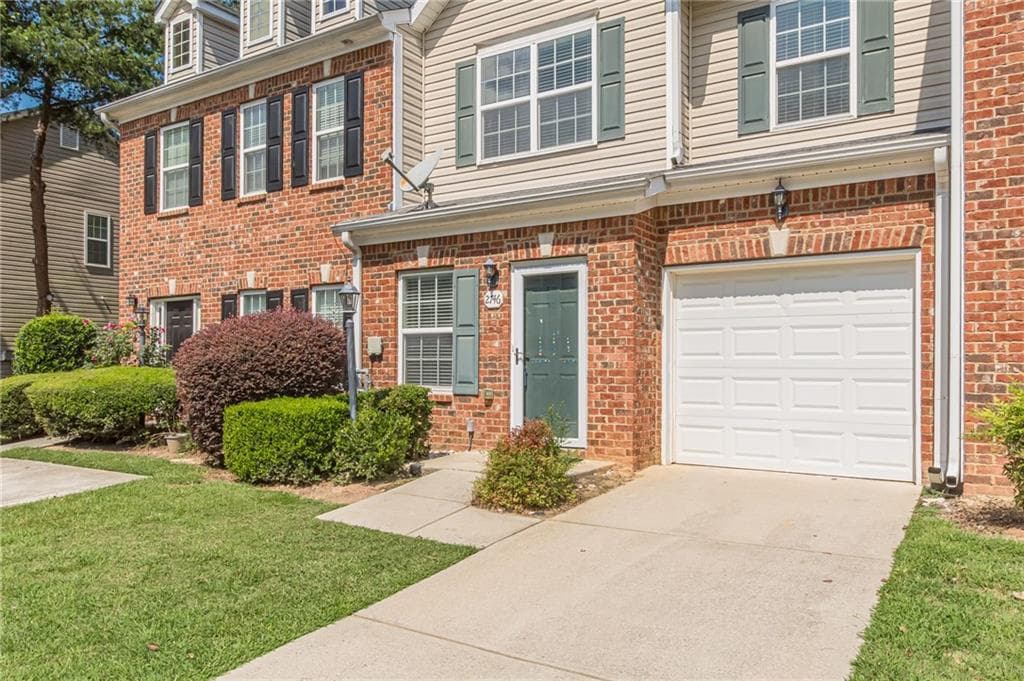 2 bedroom, 3 bathroom, 1,410 sq ft townhouse for sale at 2746 Rocky Court, Atlanta, GA 30349 — photo 2