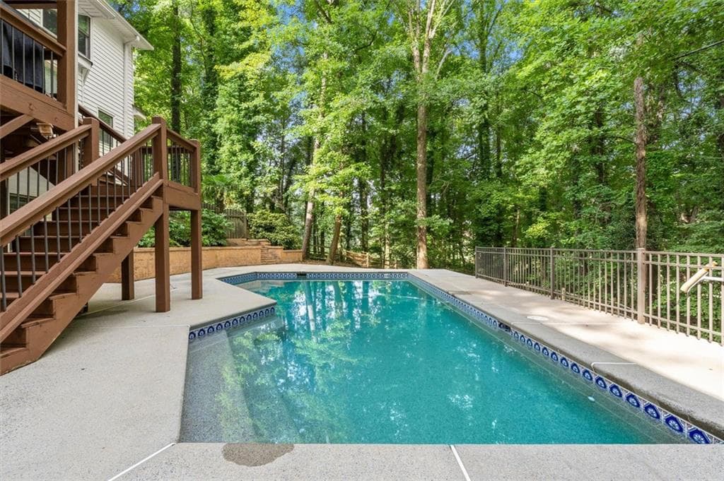 5 bedroom, 4 bathroom, 3,765 sq ft single family residence for sale at 3201 Country Club Court, Kennesaw, GA 30144 — photo 4