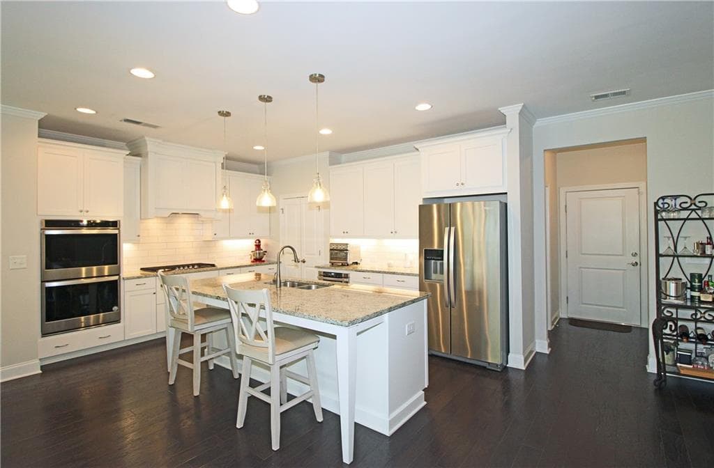 4 bedroom, 3 bathroom, 2,752 sq ft single family residence for sale at 1725 Nestledown Drive, Cumming, GA 30040 — photo 5