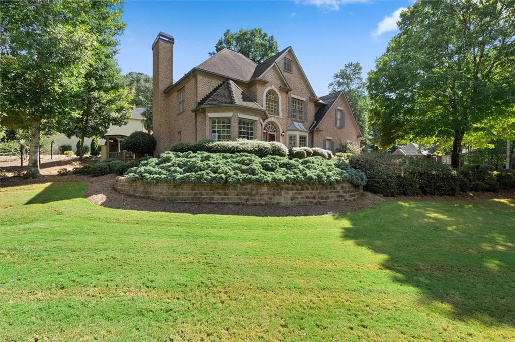4 bedroom, 3 bathroom, 2,771 sq ft single family residence for sale at 1720 Monarch Court, Cumming, GA 30041 — photo 2