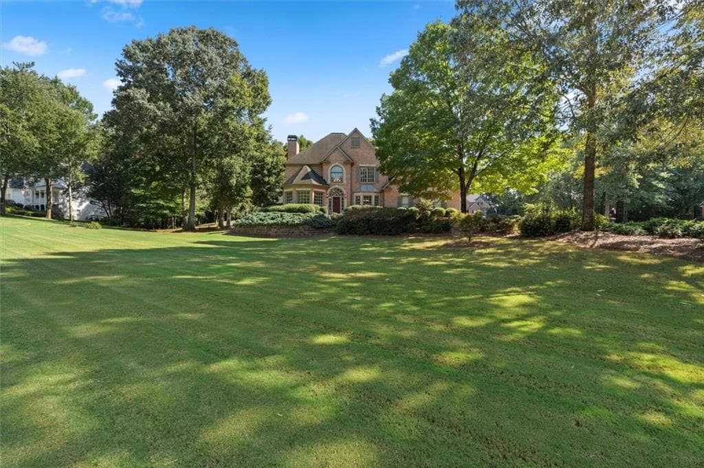 4 bedroom, 3 bathroom, 2,771 sq ft single family residence for sale at 1720 Monarch Court, Cumming, GA 30041 — photo 7