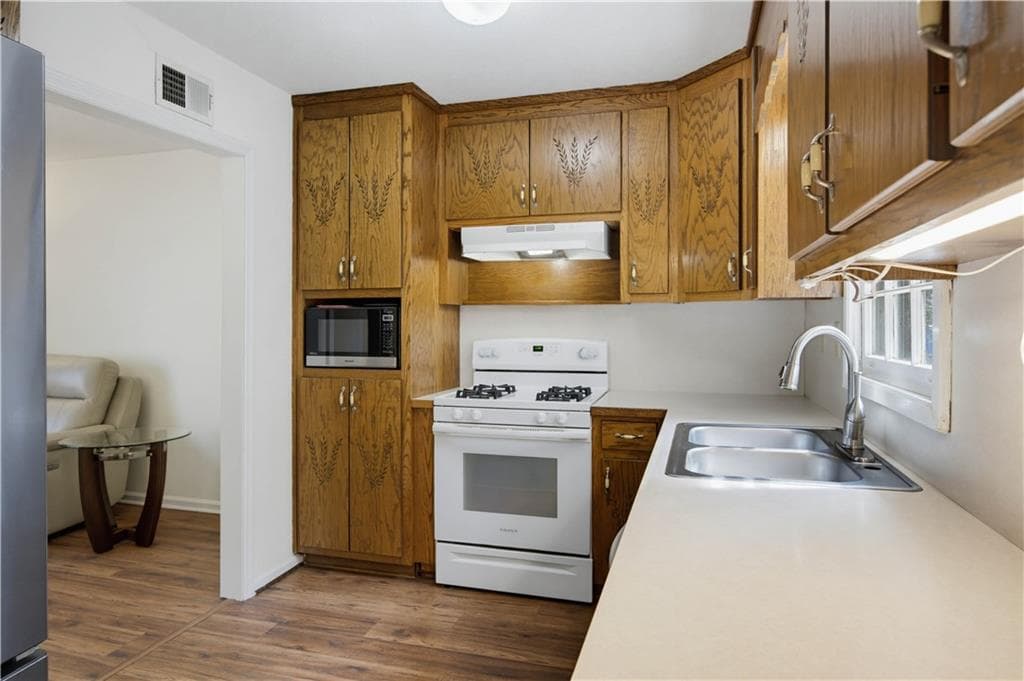 3 bedroom, 2 bathroom, 1,615 sq ft single family residence for sale at 3404 Hill Drive, Duluth, GA 30096 — photo 5