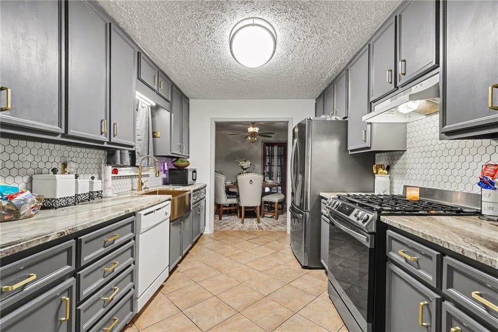 5 bedroom, 4 bathroom, 3,430 sq ft single family residence for sale at 3781 Tommy Drive, Powder Springs, GA 30127 — photo 3