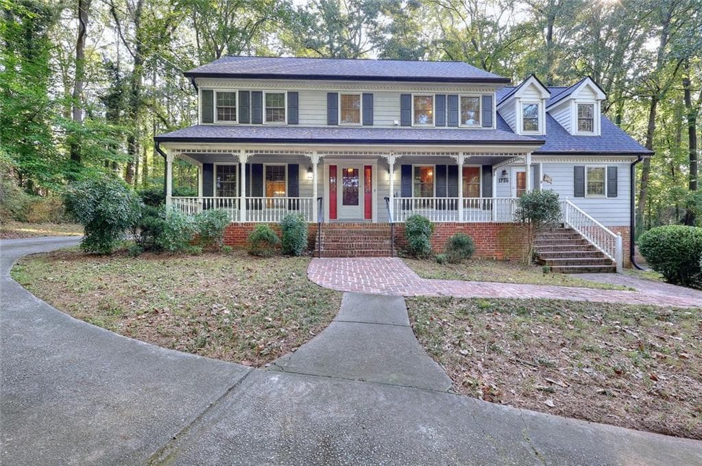 4 bedroom, 3 bathroom, 4,503 sq ft single family residence for sale at 1786 SW Bear Cave, Lilburn, GA 30047 — photo 4